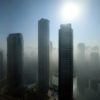 Skyscrapers amidst fog near Dubai Marina last year