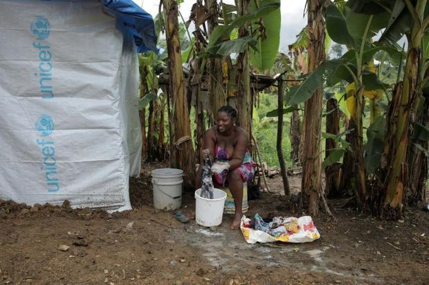 Migrants at the camp in La Penita  Panama have to cook  wash and do their washing in the open air du...