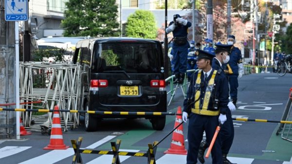 A man was arrested after a car crashed through a barrier near the Israeli embassy in Tokyo