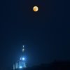 The Blue supermoon rises over the river Ganges, in Prayagraj on August 30, 2023 .