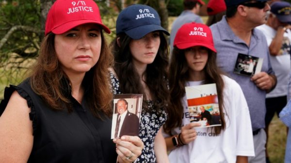 A few dozen relatives of victims and survivors of the 9/11 attacks, which killed 3,000 people, gathered near Donald Trump's golf course in Bedminster, New Jersey, ahead of the LIV Golf tournament