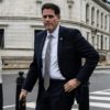 Israel's Minister for Strategic Affairs Ron Dermer walks into the Executive Office Building next to the White House on Tuesday