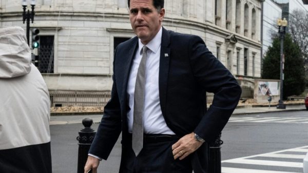 Israel's Minister for Strategic Affairs Ron Dermer walks into the Executive Office Building next to the White House on Tuesday