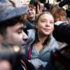 Swedish environmental activist Greta Thunberg was mobbed outside court