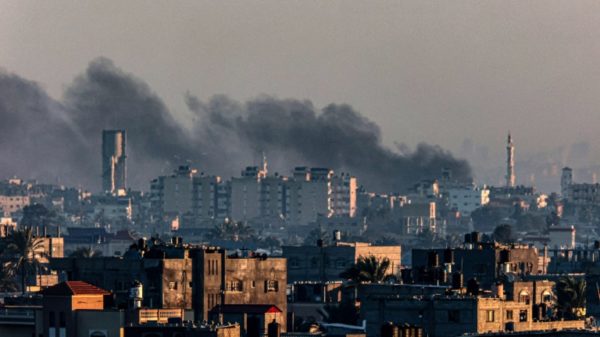 Smoke billows over Khan Yunis in the southern Gaza Strip during Israeli bombardment