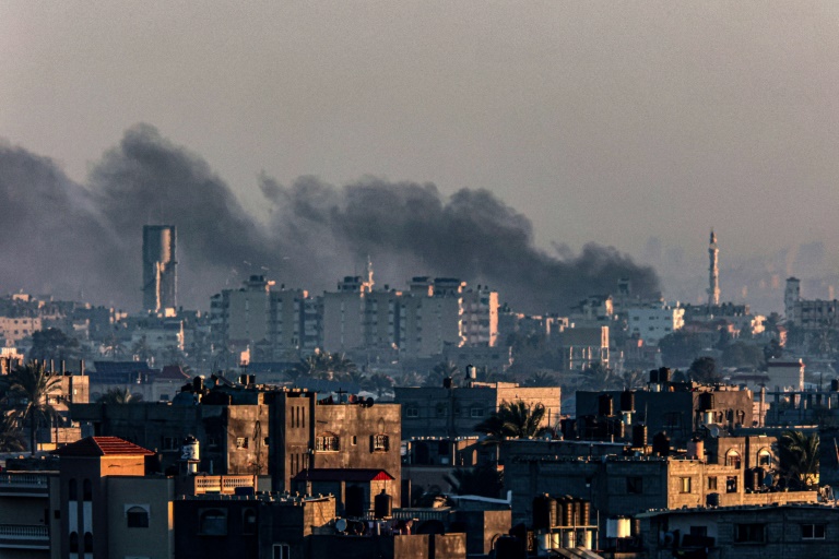 Smoke billows over Khan Yunis in the southern Gaza Strip during Israeli bombardment