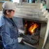 Yoshihiro Yauji, seen placing a piece of metal into a forge, believes 'blades are the foundational root of Japanese culture'