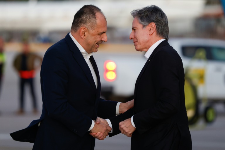 Greek Foreign Minister Giorgos Gerapetritis, left, greeted US Secretary of State Antony Blinken upon his arrival in Crete