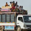 People move on June 22, 2023 along a road from Khartoum to Wad Madani, which became a safe haven until Sudan's war spread into the city and forced a new exodus