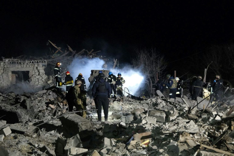 Rescuers worked at the site of the eastern Ukrainian town of Pokrovsk after a missile attack