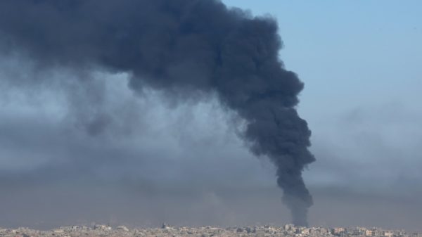 Smoke billows over the Palestinian territory during Israeli bombardment on December 29, 2023