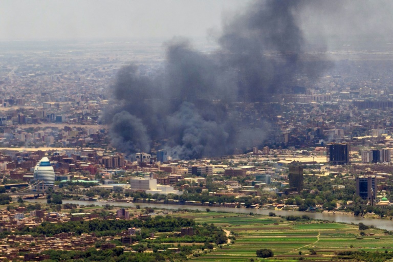 Smoke billows during fighting in the Sudanese capital Khartoum, on May 3, 2023