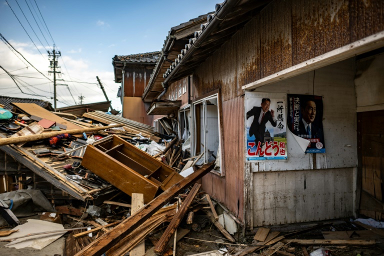 Residents of Shiromaru fled to higher ground to escape the quake-generated tsunami that tore through their village