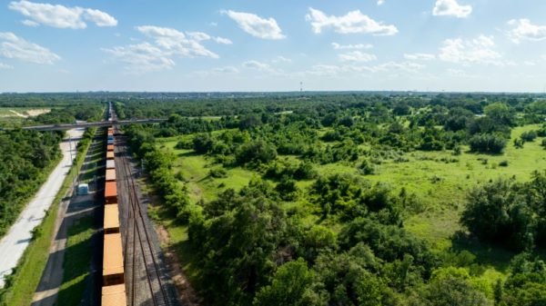 An aerial view of a freight train in the US state of Texas in April