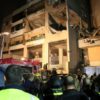 Lebanese emergency responders gather at the site of a strike attributed to Israel that killed a Hamas deputy