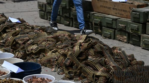 Buckets of bullets and ammunition belts were seized from within the prison