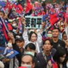 Tens of thousands converged in southern Taiwan on Sunday for the rallies of three presidential candidates