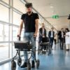 Gert-Jan, who is paralysed, walks using new technology that decodes his brain's signals