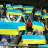 Supporters hold up Ukraine flags at the Euro 2024 qualifier against Italy last month