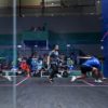 Players from Japan and Pakistan compete at the Asian Games in squash