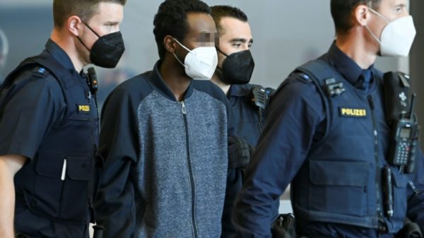 The Somali suspect, an asylum seeker with a history of mental health problems, faces charges including murder and attempted murder