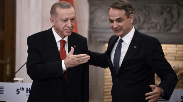 President Recep Tayyip Erdogan, left, and Greek Prime Minister Kyriakos Mitsotakis during the Turkish president's first Athens trip since 2017