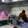 Afghan women sit beside their newborns at the Doctors Without Borders (MSF)-run maternity hospital in Khost