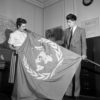 UN employees unfold a UN flag at the start of the third General Assembly of the United Nations in 1948 at the close of which was adopted on December 10 the Universal Declaration of Human Rights