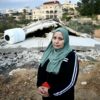 Palestinian villager Ghadeer al-Atrash in front of her bulldozed home in Al-Walaja