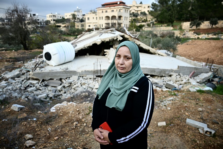 Palestinian villager Ghadeer al-Atrash in front of her bulldozed home in Al-Walaja