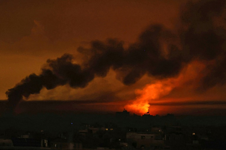 Smoke billowing over Khan Yunis in the southern Gaza Strip during Israeli bombardment