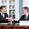 US Secretary of State Antony Blinken shakes hands with Finnish Defense Minister Antti Hakkanen during a ceremony for a defense cooperation agreement in the State Department's Treaty Room