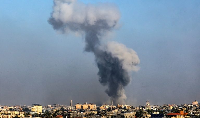 Smoke billows over Khan Yunis in the southern Gaza Strip during Israeli bombardment