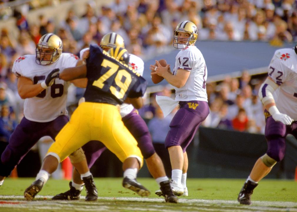 Quarterback Billy Joe Hobert of the Washington Huskies drops back to pass.