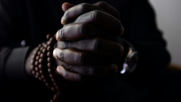 Sheikh Issa, an African faith healer in the Paris suburbs