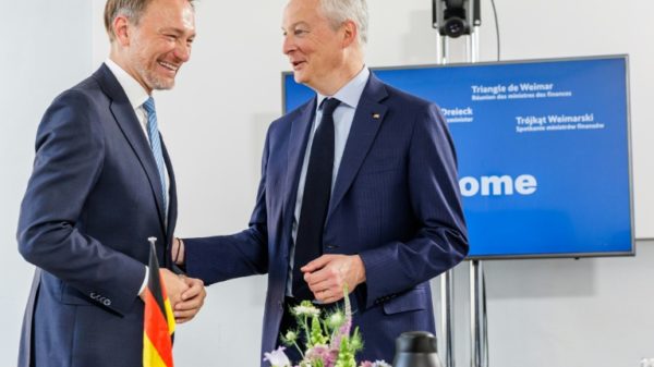 German Finance Minister Christian Lindner (L) and French counterpart Bruno Le Maire chat prior to a meeting in June 2023