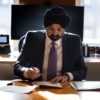 World Bank President Ajay Banga works at his desk at the World Bank headquarters in Washington, DC, on January 3, 2024