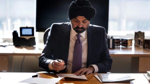 World Bank President Ajay Banga works at his desk at the World Bank headquarters in Washington, DC, on January 3, 2024