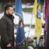 Ukrainian President Volodymyr Zelensky pays his respects at the graves of Ukrainian soldiers in Lviv