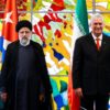 Cuban President Miguel Diaz-Canel (R) and Iran's President Ebrahim Raisi appear together in Havana on June 15, 2023