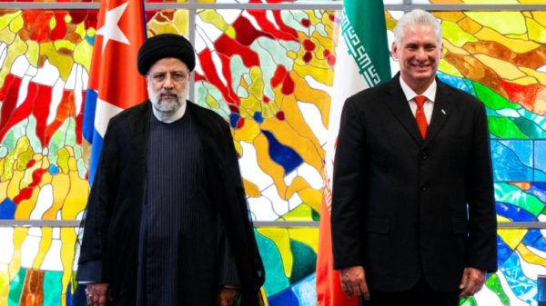 Cuban President Miguel Diaz-Canel (R) and Iran's President Ebrahim Raisi appear together in Havana on June 15, 2023