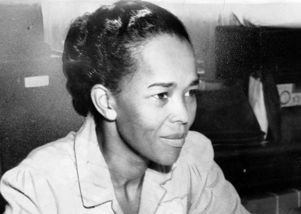 Portrait of Ella Baker seated at desk.