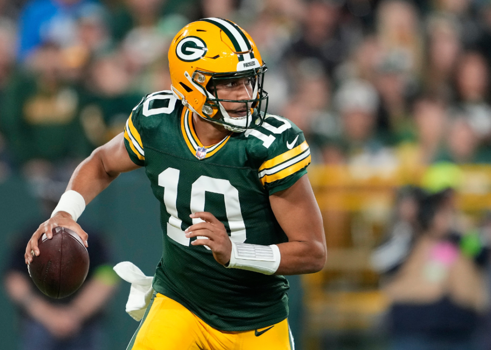 Jordan Love, #10 of the Green Bay Packers, looks to throw a pass against the Detroit Lions during the game at Lambeau Field in Green Bay, Wisconsin.